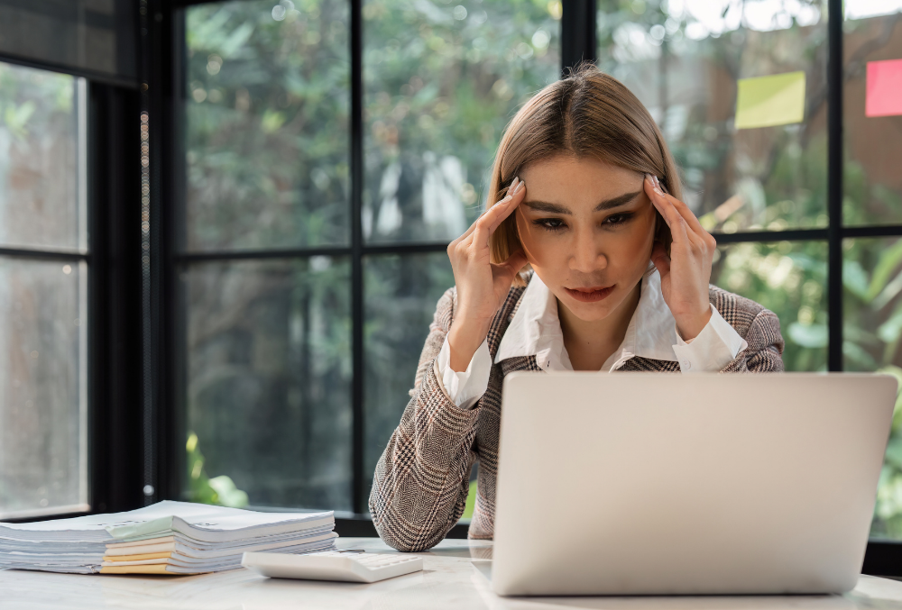 A business woman is feeling lost with SEO and looks frustrated