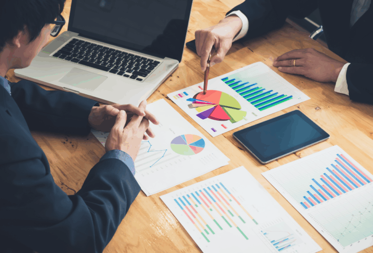 A digital marketer and business owner going over the digital marketing cheat sheet